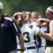 Saline players embrace after losing to Mattawan 7-3 on Tuesday, June 11. Daniel Brenner I AnnArbor.com